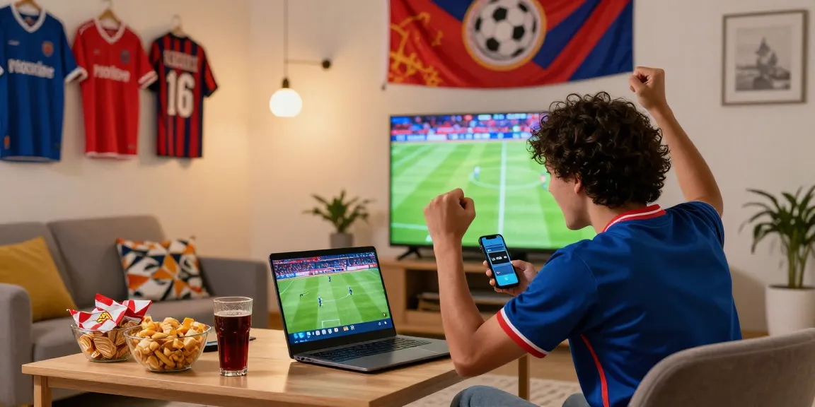 Excited fan enjoying Pelotalibre's live football streaming with snacks and team merchandise.